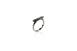 Sleek, modern silver-toned ring with a triangular design, perfect for stacking with other rings. Crafted from high-quality materials for a sophisticated look.