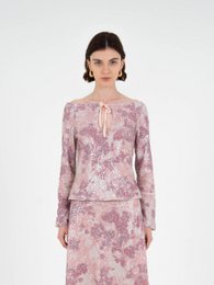 Top met sterrenprint en pailletten
