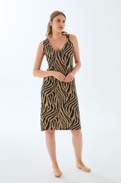 Sleeveless zebra print midi dress with v-neck and adjustable straps.