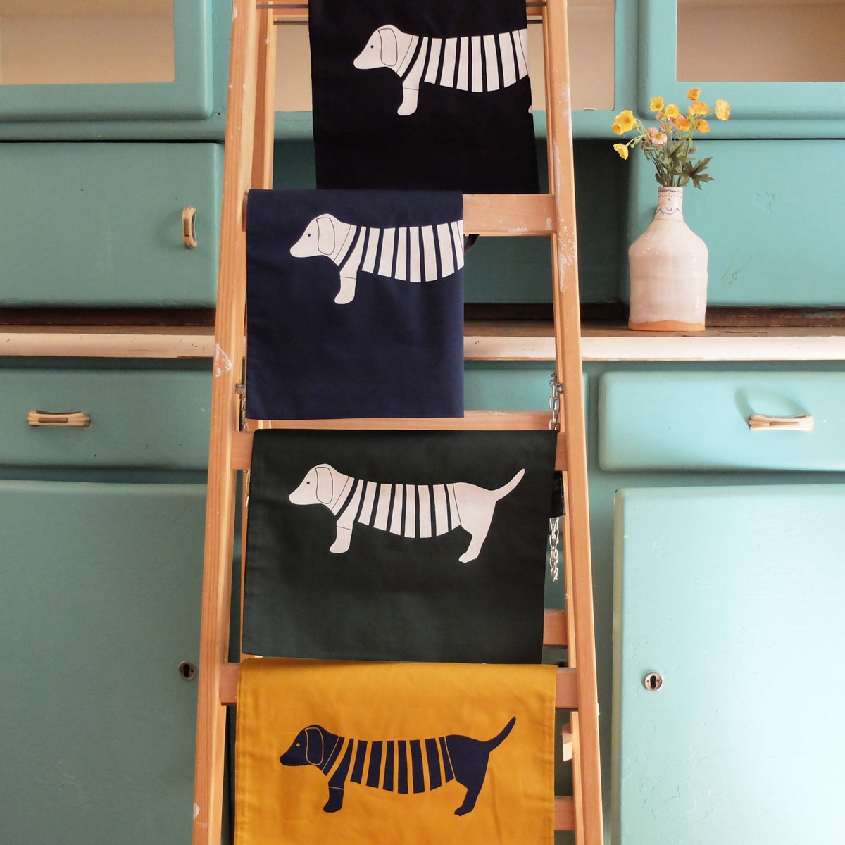 hand-printed fabric bag with mustard dachshund motif