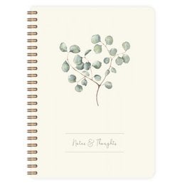 A5 notepad with a botanical illustration of eucalyptus leaves on the cover. The notepad is available in blank, grid, lined, and dot grid formats.