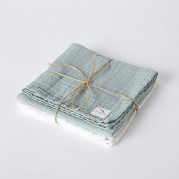 Organic cotton muslin swaddle set in aqua color, hand embroidered, set of 2 pieces.