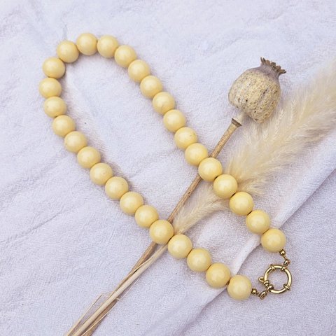 Kralenketting soft yellow