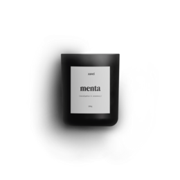 A tall, round black candle with a white label displaying the word "menta".
