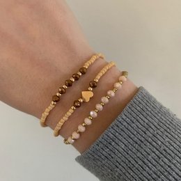 Goude set armbandjes met hartje