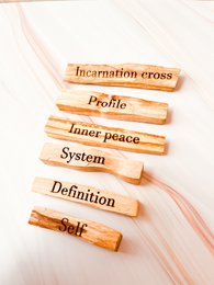 Palo Santo incense sticks, natural wooden sticks with a floral accent, ideal for meditation and relaxation.
