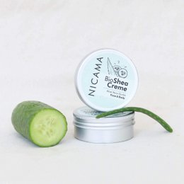 "Bio Shea cream with aloe vera and cucumber, natural skincare moisturizer in white jar"