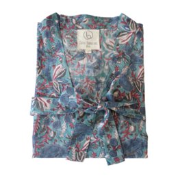  Floral cotton kimono in a vibrant, colorful print. Features a loose, relaxed fit and a self-tie waist. Ideal for lounging or as a lightweight cover-up.