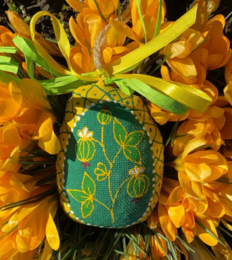 Small green Easter Egg with berries