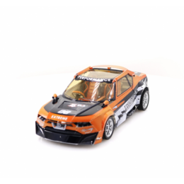 Metallic-colored building kit of a Nissan Sportscar IDX model, featuring an orange and black color scheme, racing decals, and a sporty, angular design.