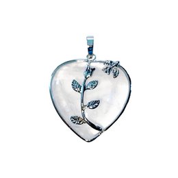 A heart-shaped rock crystal pendant with floral accents. The pendant is made of clear crystal and features delicate floral designs.