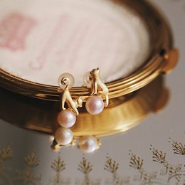 Orecchini e collana asimmetrici con gatti