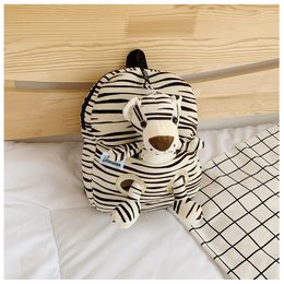 Striped zebra-patterned backpack for kids, featuring a plush zebra design and compartments for storing school supplies.