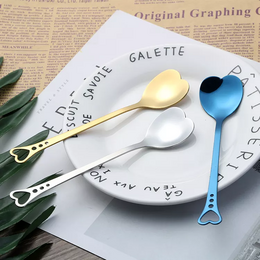 Heart-shaped stainless steel spoons in 4 colors - silver, gold, rose gold, and rainbow - for use with tea, coffee, or desserts.