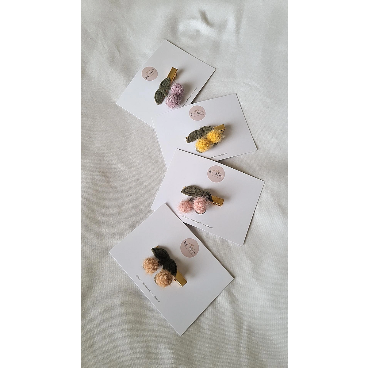 Clips de lana de cereza