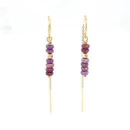 Elegant gold-tone ear climber earrings featuring a row of purple and burgundy beads.