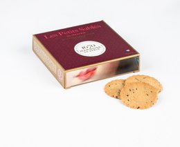 Chocolate chip shortbread cookies in a 100g cardboard box. The cookies have a golden brown color and appear to be round in shape.