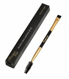 Eyebrow dip pomade brush with a gold-colored handle for precise eyebrow shaping and grooming.