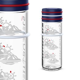 A clear glass travel bottle with a red and blue striped lid. The bottle features a printed design of mountains and snowflakes.