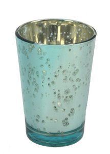 Glass with candle light blue