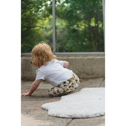 Baby pants with apple tree blossom print, soft and comfortable for infants.