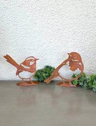 Pájaro fabricado en acero inoxidable con aspecto de acero corten.