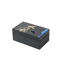 Black rectangular jewelry box with gold deer design, metal handle, blue interior lining, elegant storage.