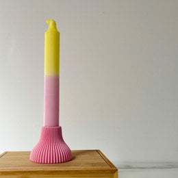  Soft pink candle holder with a tall, round shape and a pleated design. Available in a variety of colors including mint, blue, black, white, grass green, soft pink, pretty pink, lilac, orange, transparent white, and grey.