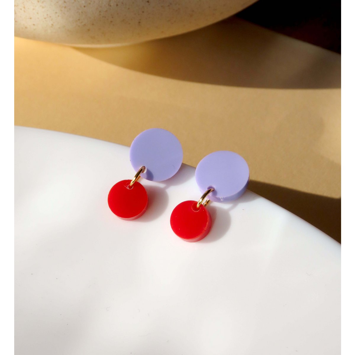 Big Dotty acrylic earrings in lilac red