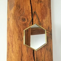 Specchio esagonale in ottone