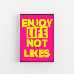 Vibrant wall art print with the text "ENJOY LIFE NOT LIKES" in bold, contrasting colors. This modern, typographic design is suitable for home or office decor, conveying a positive message about living life to the fullest.