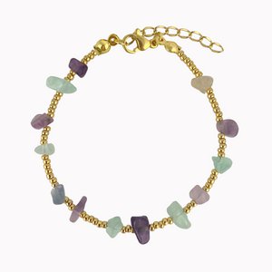 Gold bracelet with green stones