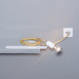 Sliding shelf light Skipper w/g, a wall light with a sliding shelf feature. The light has a gold-colored metal frame and a white light source.