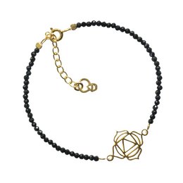 A gold-toned charm bracelet with black beads and a gold-toned lotus flower charm. The bracelet features an adjustable clasp for a customized fit.