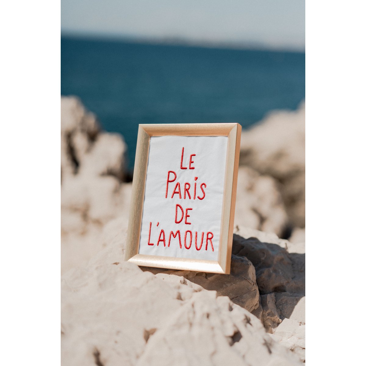 Paris in embroidered cotton frame
