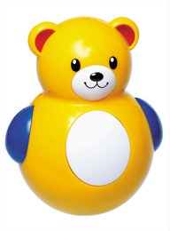 Colorful, plush bear-shaped tumbler toy for kids. Features a round, yellow body with red ears and a smiling face.