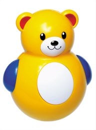 Colorful, plush bear-shaped tumbler toy for kids. Features a round, yellow body with red ears and a smiling face.