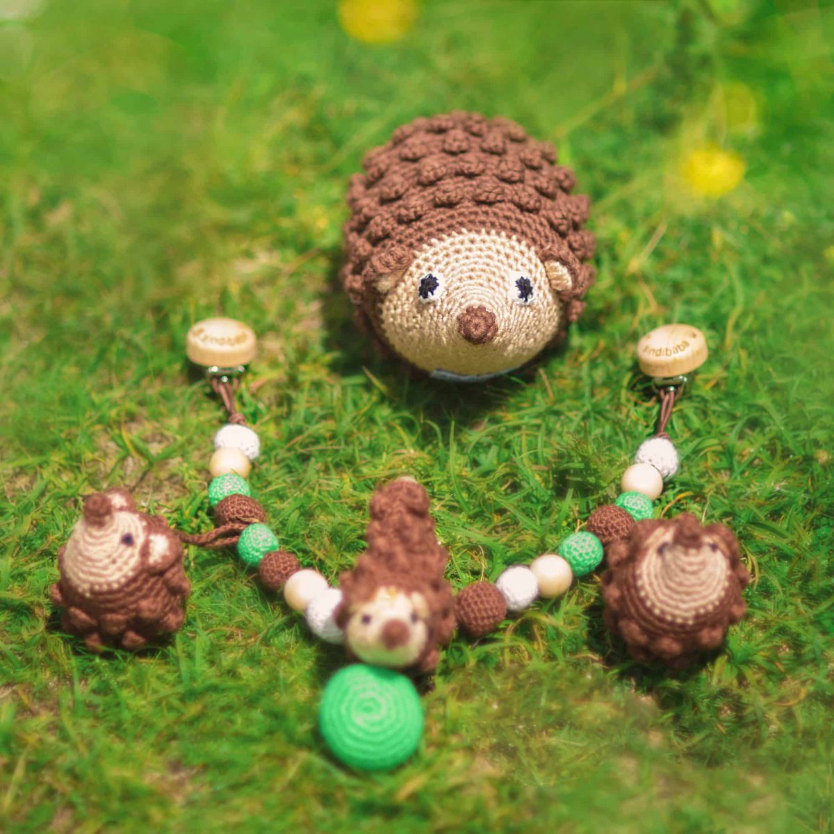 Crocheted grabbing toy hedgehog HARRY in brown