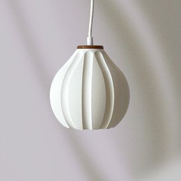 A white, flower-shaped ceiling light with a round, bulbous shape and a wooden accent.
