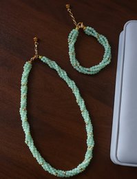 Set collana e bracciale intrecciati in giada fortunata