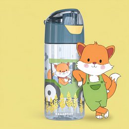 A children's water bottle with a tractor and fox design. The bottle is light-colored with a yellow cap and features a cartoon-style illustration of a fox riding on a tractor in a rural landscape.