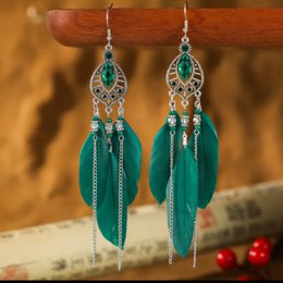 Boucles d'oreilles BOHO avec plumes (vert)