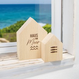 Large decorative wooden house by the sea made of sustainable beech wood