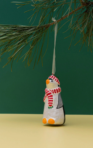 Handmade papier-mache Penguin in cap and scarf
