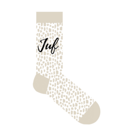 Beige and white patterned socks with the text "July" printed on them.