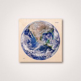 Puzzle depicting a detailed image of the Earth from space, showcasing the planet's continents and oceans.