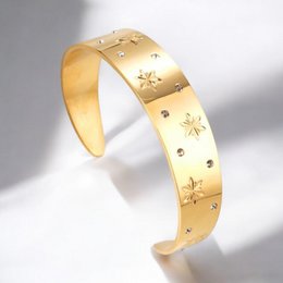 STELLAR GLOW - Rigid Bracelet with Stars in gold-plated steel