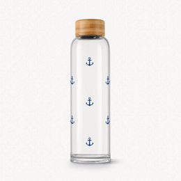 Glass drinking bottle with a "Nordic by nature" design featuring navy blue anchor icons, 0.6l capacity, by BELAMY brand, suitable for travel.