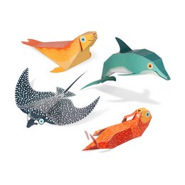 Colorful paper marine animal toys featuring a dolphin, shark, and fish in various shapes and styles.