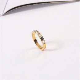 Samoa - Dainty Baguette Crystal Gold Band